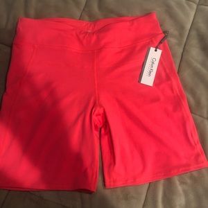 Coral color spandex Calvin Klein bike shorts